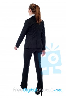 Woman In Walking Posture Stock Photo