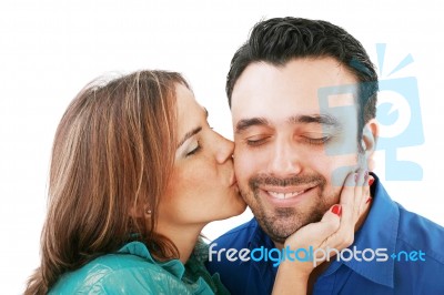 Woman Kissing Her Boyfriend Stock Photo