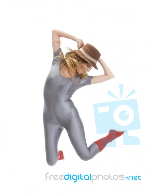 Woman Leaps In Air Stock Photo