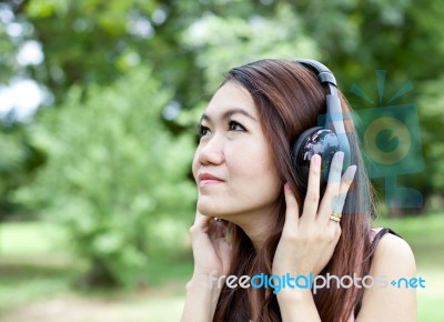 Woman Listening Music Stock Photo