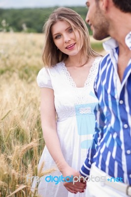 Woman Looking Her Boyfriend, Woman On Focus Stock Photo