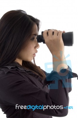 Woman Looking Through Binocular Stock Photo