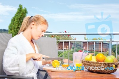 Woman Making Morning Juice Stock Photo