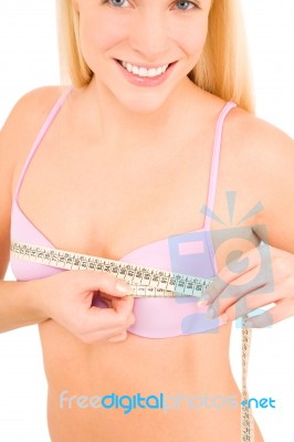 Woman Measuring Her Bust Stock Photo