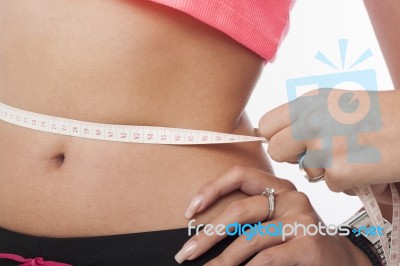 Woman Measuring Her Perfect Waist Stock Photo