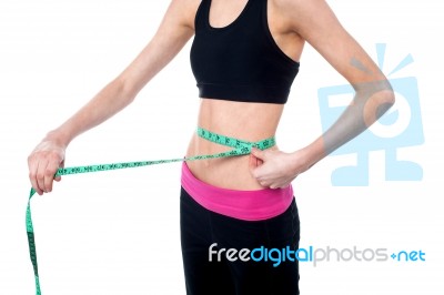 Woman Measuring Her Waist Stock Photo