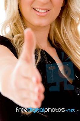 Woman Offering Hand Shake Stock Photo