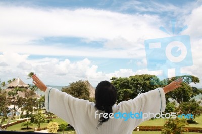 Woman On Balcony Stock Photo