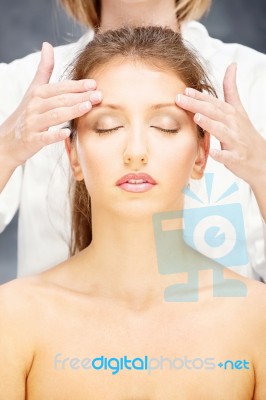 Woman On Head Massage Stock Photo