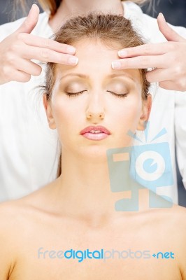 Woman On Head Massage Stock Photo