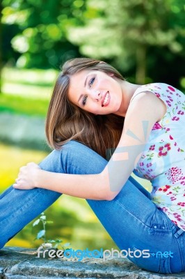 Woman On Sunny Day In Park Stock Photo