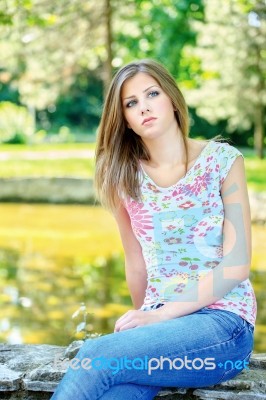 Woman On Sunny Day In Park Stock Photo