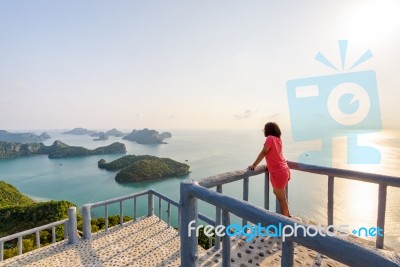 Woman On The Peak Mountain Stock Photo