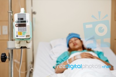 Woman Patient And Medical Instrument Stock Photo