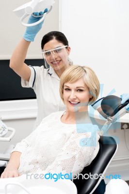 Woman Patient Sitting At Stomatology Clinic Stock Photo