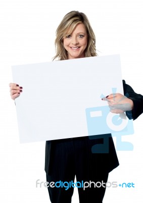 Woman Pointing At Billboard Stock Photo