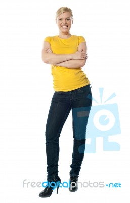 Woman Posing With Crossed Arms Stock Photo