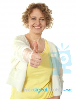 Woman Posing With Thumbs Up Stock Photo