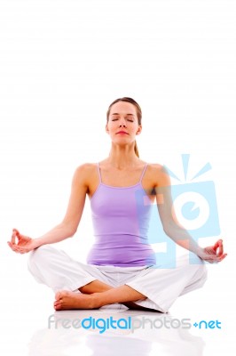 Woman Practicing Yoga Stock Photo
