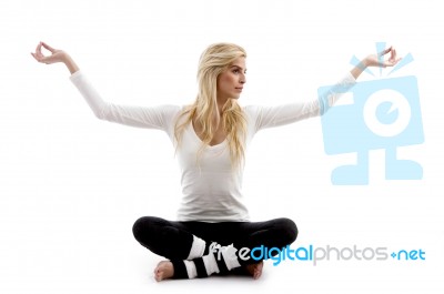 Woman Practicing Yoga Stock Photo