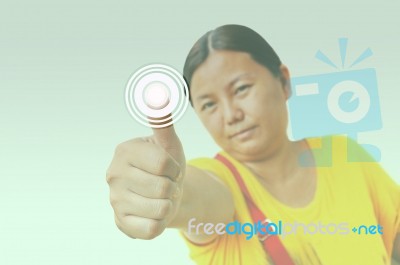 Woman Pressing The Button Stock Photo