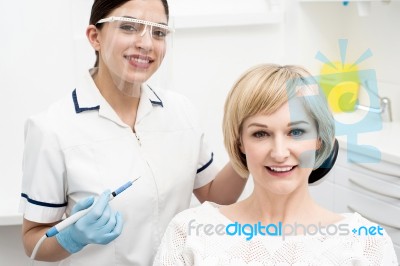 Woman Ready For A Dental Exam Stock Photo