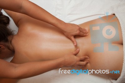 Woman  Receiving A Massage On Her Back During A Physiotherapy Se… Stock Photo