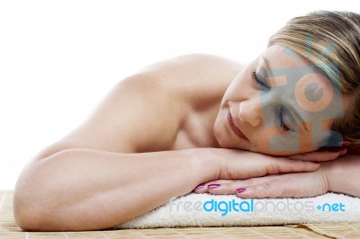 Woman Relaxing At Spa Centre Stock Photo