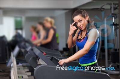 Woman Running On Treadmill Stock Photo