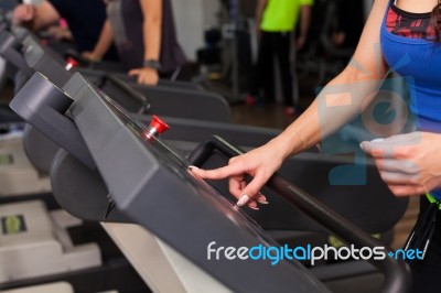 Woman Running On Treadmill Stock Photo