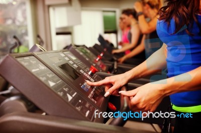 Woman Running On Treadmill Stock Photo