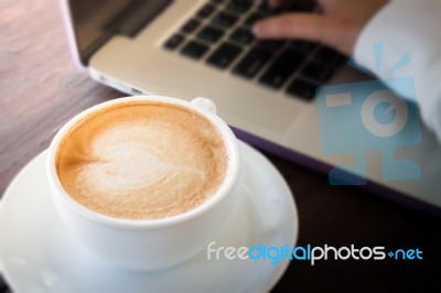 Woman Serve The Internet At Coffee Shop Stock Photo