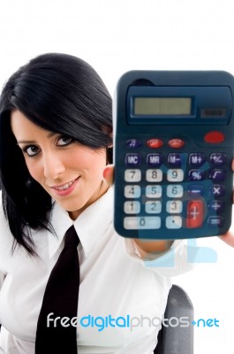 Woman Showing Calculator Stock Photo