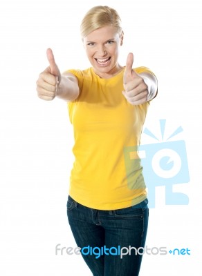 Woman Showing Double Thumbs-up Stock Photo