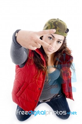 Woman Showing Peace Sign Stock Photo