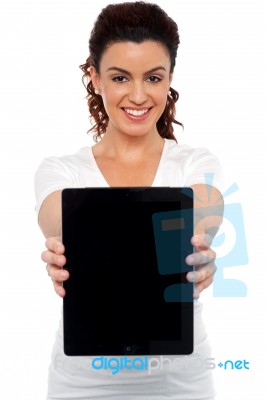 Woman Showing tablet pc Stock Photo