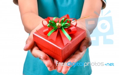 Woman Smile And Hold Gift Box In Hands Stock Photo