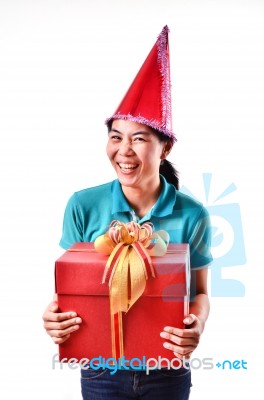 Woman Smile And Hold Gift Box In Hands Stock Photo