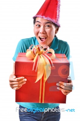 Woman Smile And Hold Gift Box In Hands Stock Photo