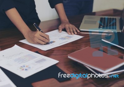 Woman Standing And Writing Document Hand Close Up At Desk Stock Photo