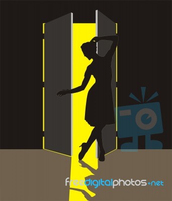 Woman Standing In Doorway Stock Image