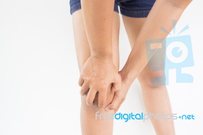 Woman Suffering From Knee Pain,woman Healthcare Concept And Ideas  Stock Photo