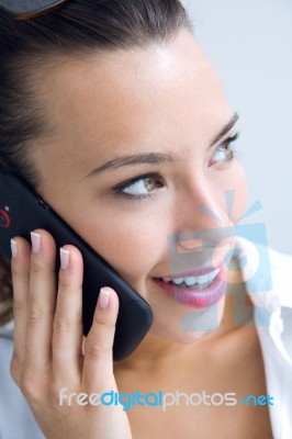 Woman Talking On The Mobile Phone Stock Photo