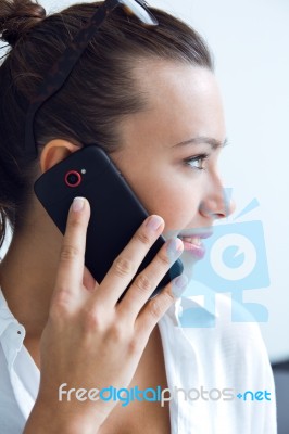 Woman Talking On The Mobile Phone Stock Photo