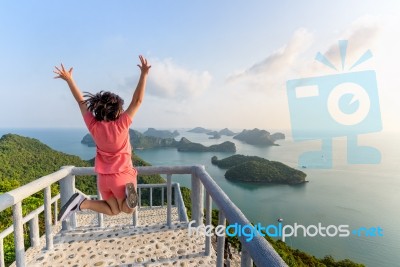 Woman Tourist On Peak Viewpoint Of Island Stock Photo