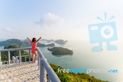 Woman Tourist On Peak Viewpoint Of Island Stock Photo