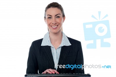 Woman Typing On Keyboard Stock Photo