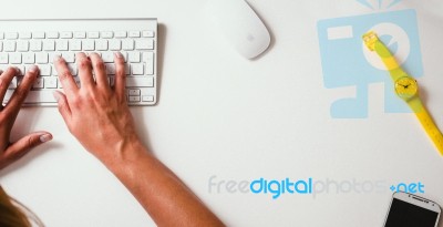 Woman Typing On Keyboard Stock Photo