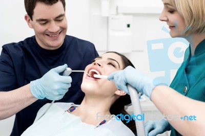 Woman Under Dental Treatment Stock Photo