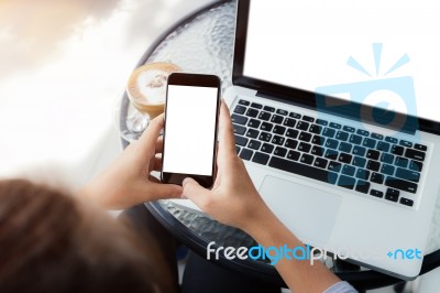 Woman Using Phone On Work Table In Coffee Shop Stock Photo